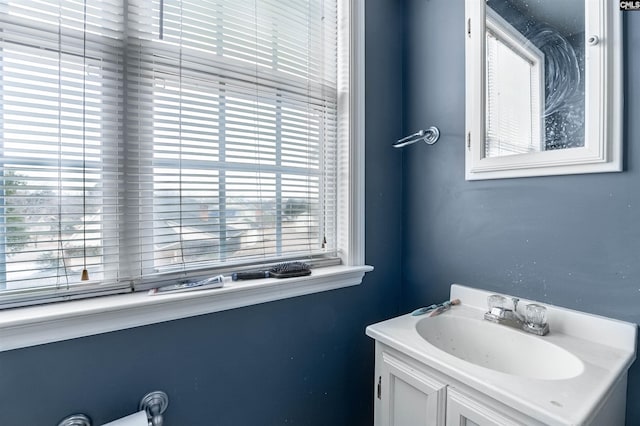 bathroom featuring sink and a wealth of natural light