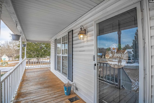 wooden terrace with covered porch