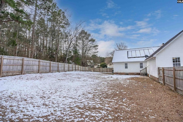 view of yard covered in snow