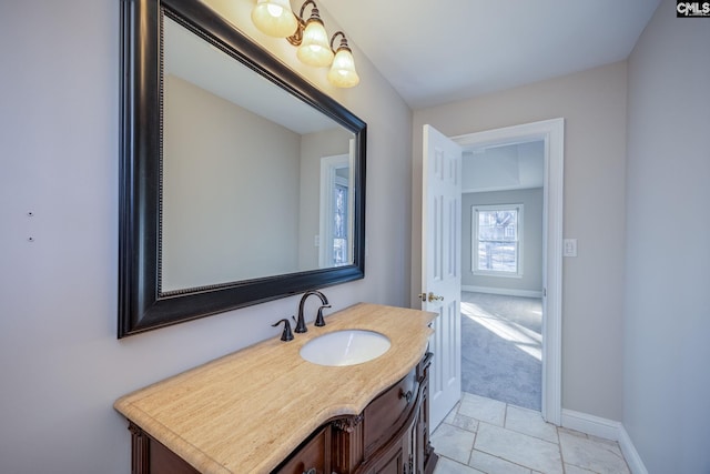 bathroom featuring tile patterned floors and vanity