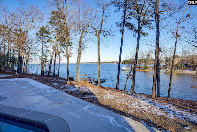 exterior space with a water view