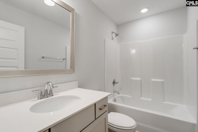 full bathroom featuring vanity, toilet, and bathing tub / shower combination