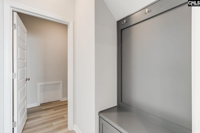 interior space featuring vaulted ceiling and hardwood / wood-style floors