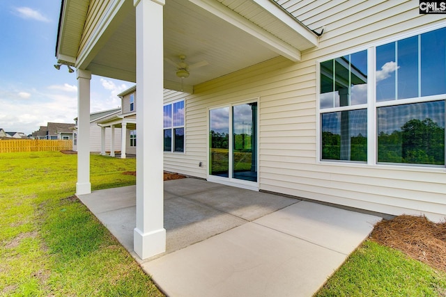 view of patio / terrace featuring fence