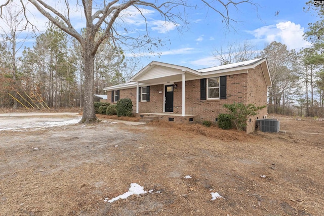 ranch-style house with central AC unit