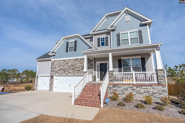 craftsman-style house with a garage and a porch