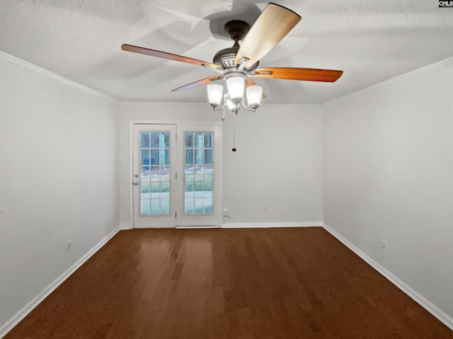 spare room featuring hardwood / wood-style flooring, ceiling fan, and a textured ceiling