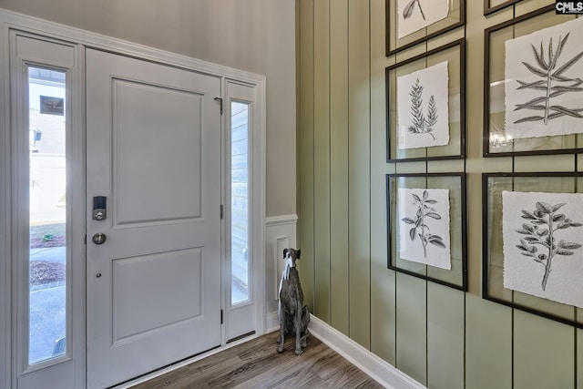 foyer with wood-type flooring