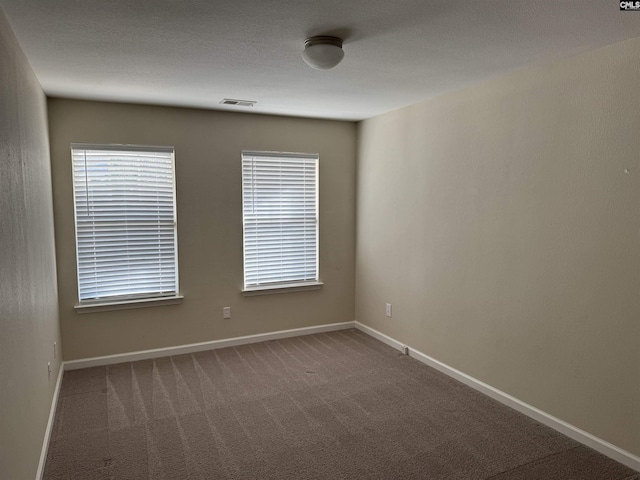 empty room featuring carpet