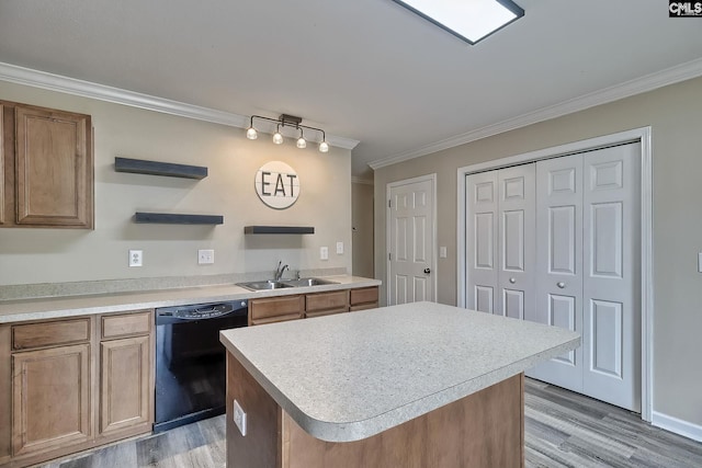 kitchen featuring a kitchen island, dishwasher, sink, light hardwood / wood-style floors, and crown molding