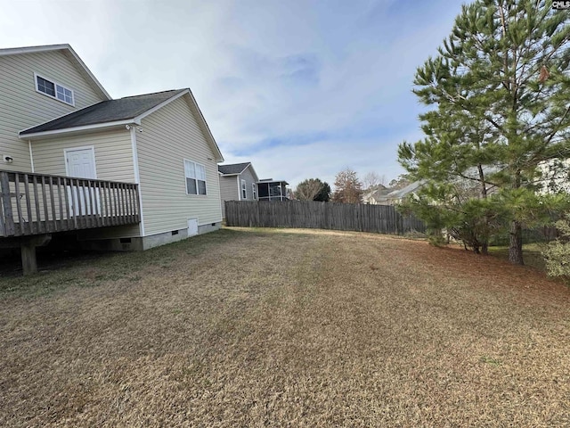 view of yard with a deck