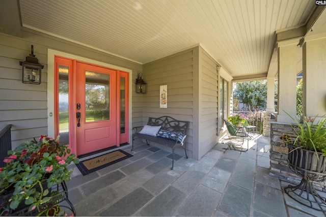 entrance to property with covered porch