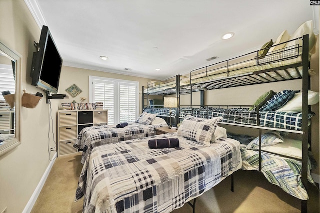 bedroom featuring ornamental molding and light colored carpet