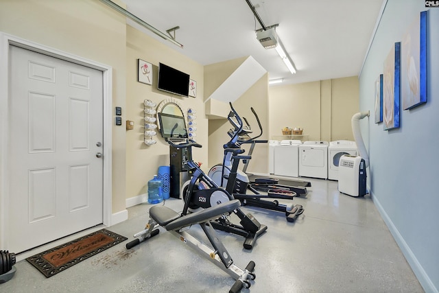 workout room featuring separate washer and dryer