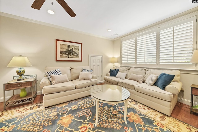 living room featuring hardwood / wood-style flooring, ceiling fan, and ornamental molding