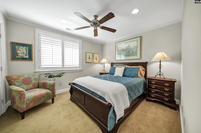 bedroom with crown molding, light colored carpet, and ceiling fan