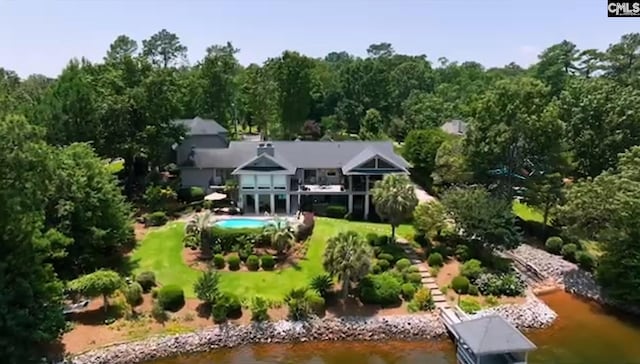 birds eye view of property featuring a water view