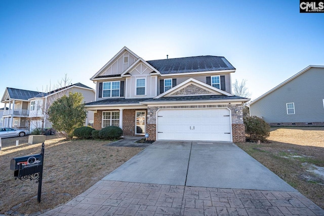 view of front of property featuring a garage