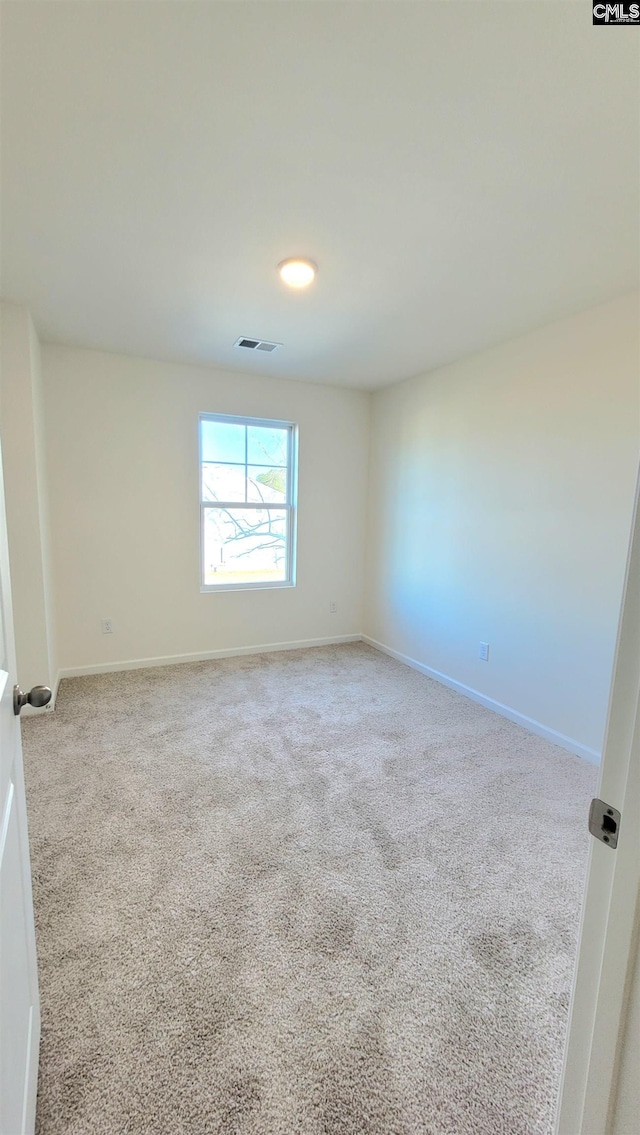 1706 Canopy Dr # 37, Sumter, SC 29150 - spare room featuring carpet and baseboards