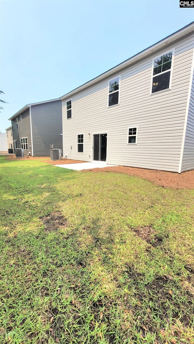 1706 Canopy Dr # 37, Sumter, SC 29150 - rear view of property with a lawn, a patio area, and central air condition unit