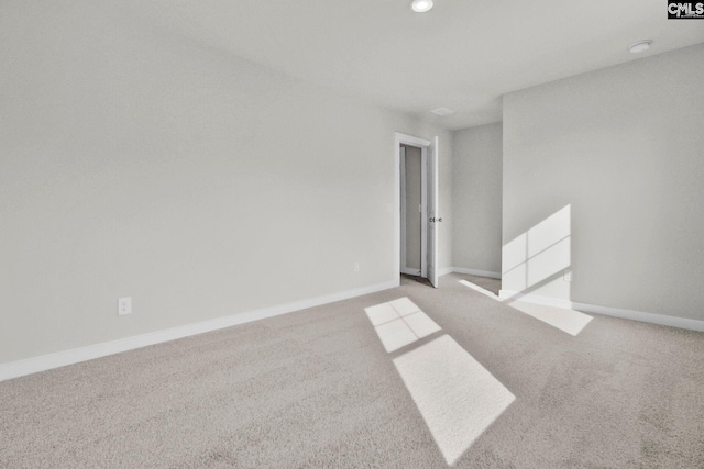 empty room featuring carpet floors