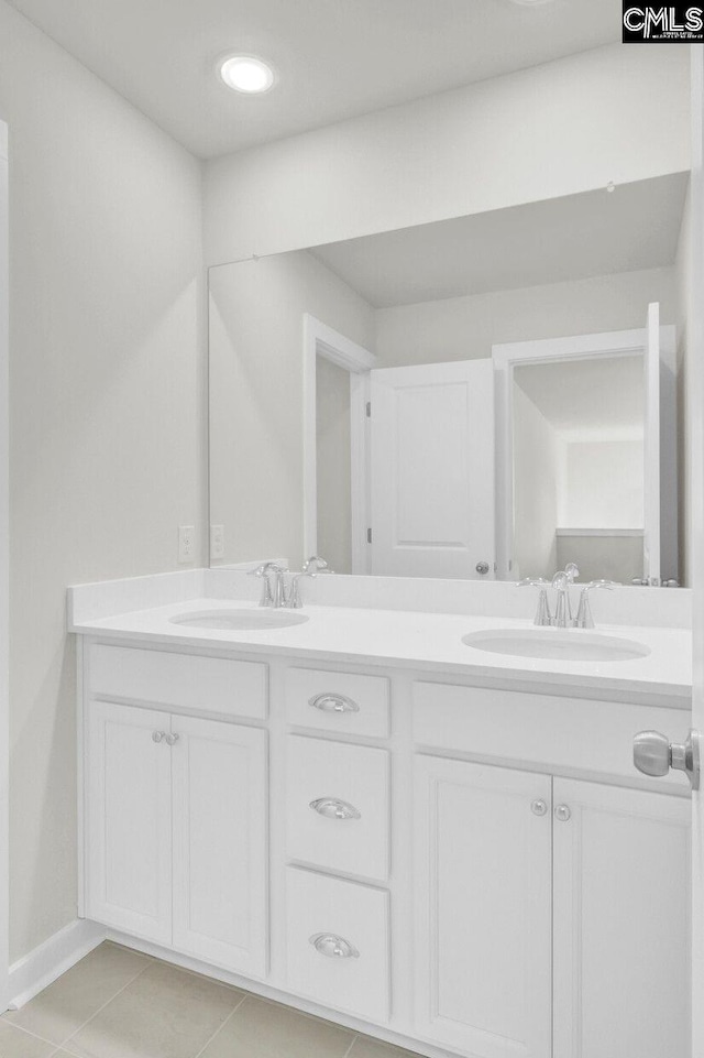 bathroom featuring vanity and tile patterned floors