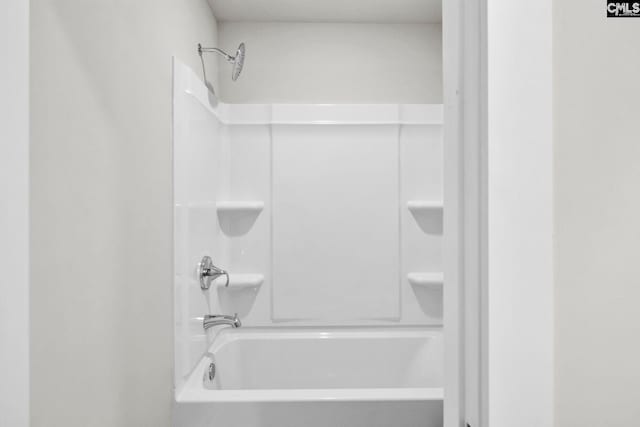 bathroom with shower / tub combination