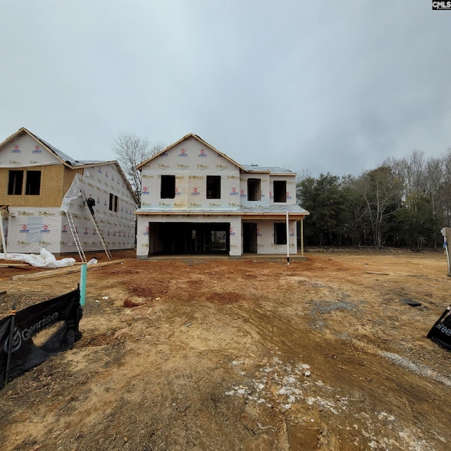 property in mid-construction featuring a garage