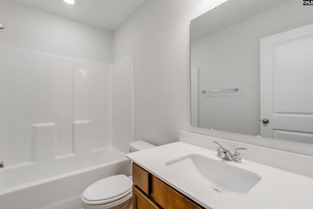 full bathroom with washtub / shower combination, vanity, and toilet