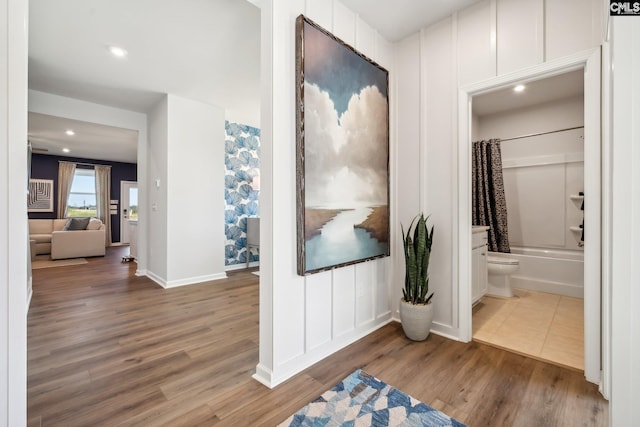 hallway featuring hardwood / wood-style floors