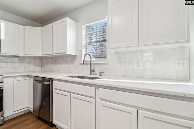 kitchen featuring white cabinetry, sink, backsplash, and stainless steel dishwasher