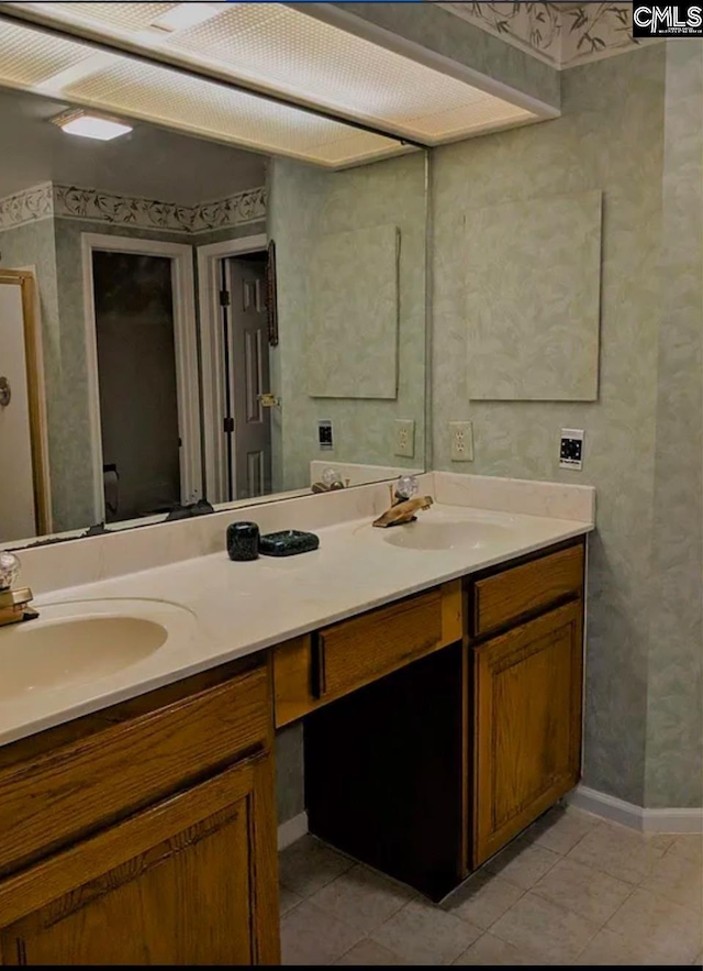 bathroom with vanity and tile patterned flooring