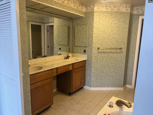 bathroom featuring vanity and a bathtub