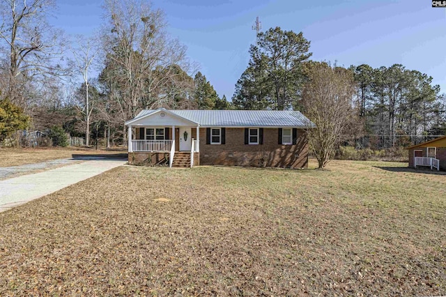 single story home with a front yard and a porch