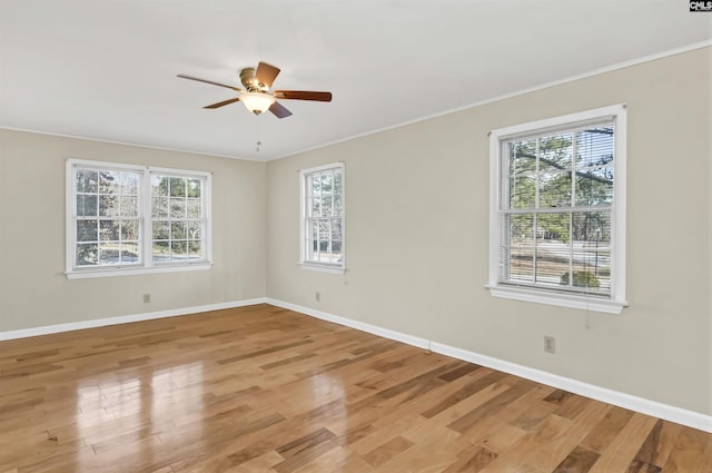 unfurnished room featuring ceiling fan and hardwood / wood-style floors