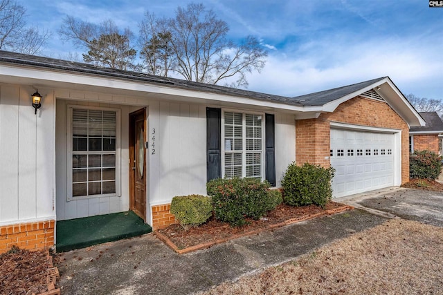 entrance to property with a garage