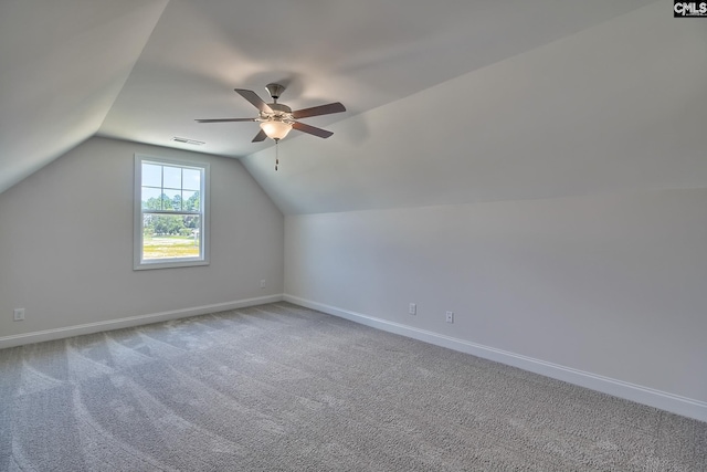 bonus room featuring vaulted ceiling, ceiling fan, and carpet flooring