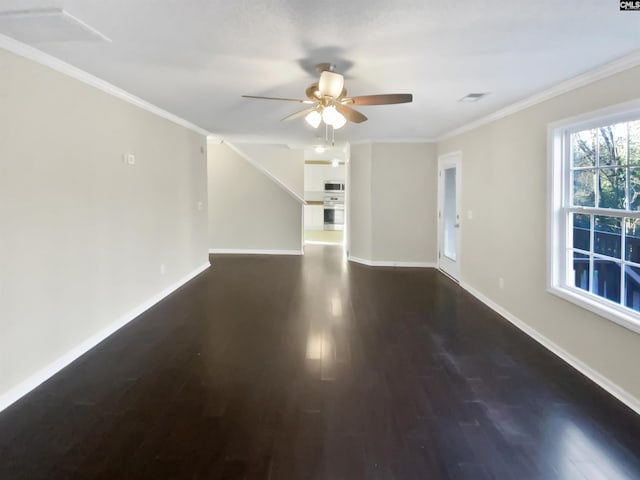 unfurnished living room with crown molding, ceiling fan, and dark hardwood / wood-style floors