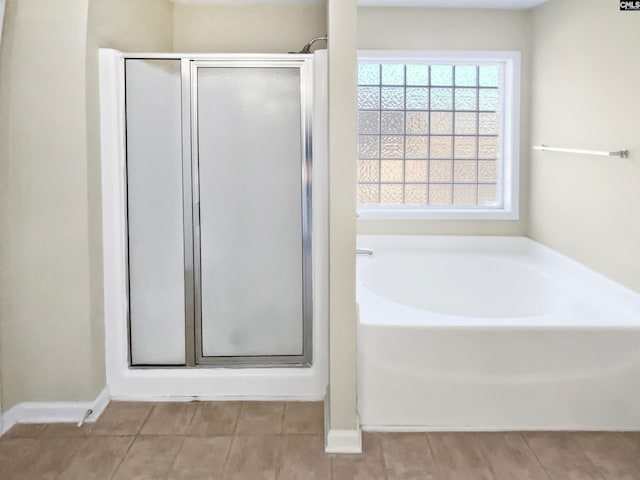 bathroom with independent shower and bath