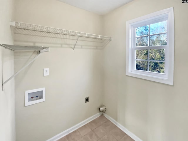 laundry area with light tile patterned flooring, electric dryer hookup, and washer hookup