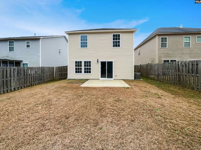 rear view of property with a patio area and a lawn