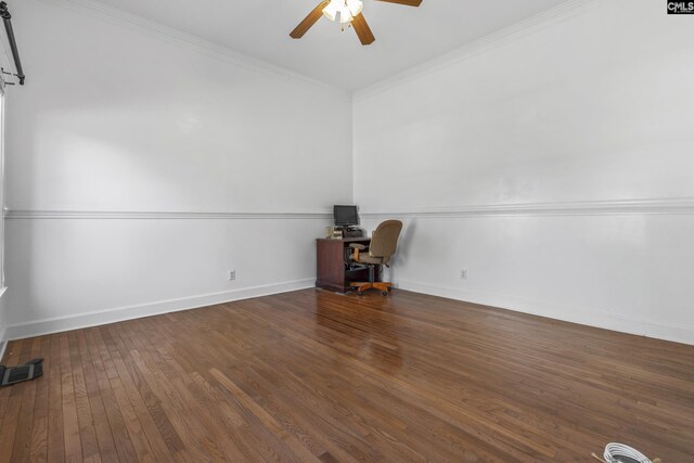 empty room with ceiling fan, ornamental molding, and dark hardwood / wood-style floors