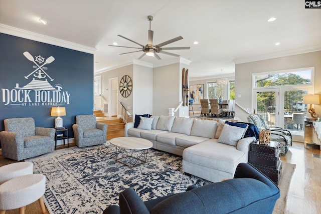 living room featuring wood-type flooring and crown molding