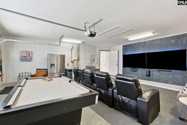 interior space featuring billiards, a textured ceiling, and concrete floors