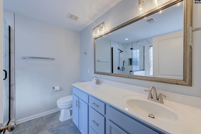 bathroom with a shower with door, vanity, and toilet