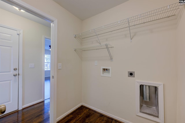 clothes washing area featuring electric dryer hookup, hookup for a washing machine, and dark hardwood / wood-style floors