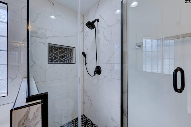 bathroom featuring walk in shower