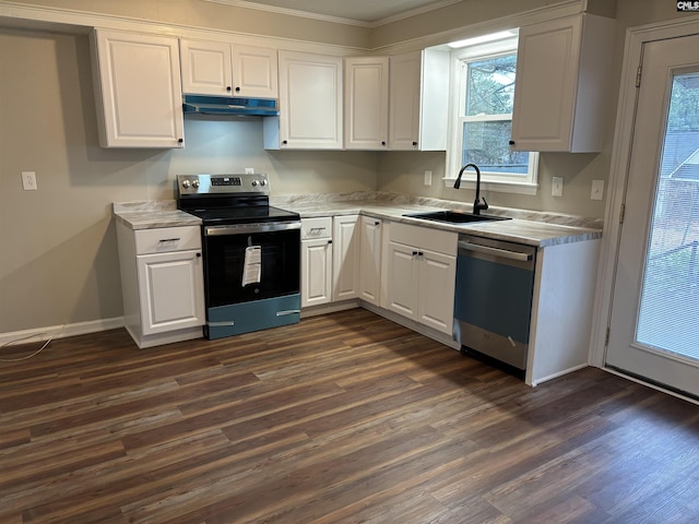 kitchen with sink, appliances with stainless steel finishes, ornamental molding, white cabinets, and dark hardwood / wood-style flooring