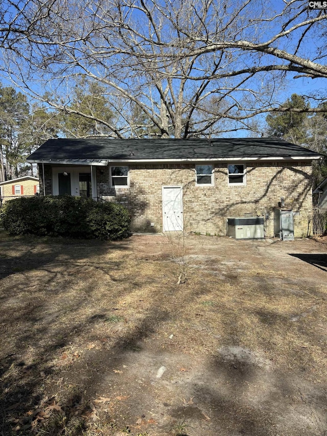 view of side of property featuring cooling unit