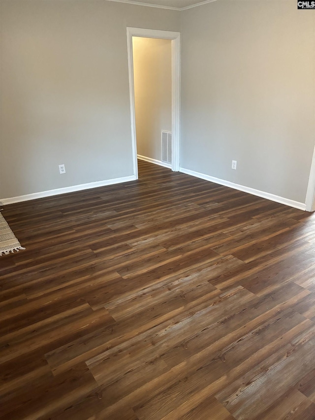 unfurnished room featuring dark hardwood / wood-style floors